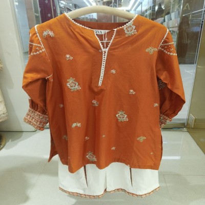 Rust Orange Embroidered Kurti with White Palazzo