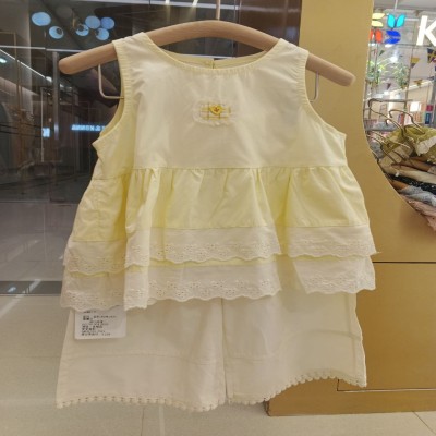 Pale Yellow Tiered Eyelet Tunic & White Pom-Pom Pants Set