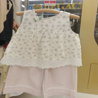 White Floral Print Sleeveless Top with Eyelet Hem & Light Pink Shorts