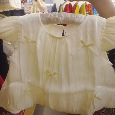 Girls' Cream Pleated Chiffon Tiered Dress with Satin Bow Accents