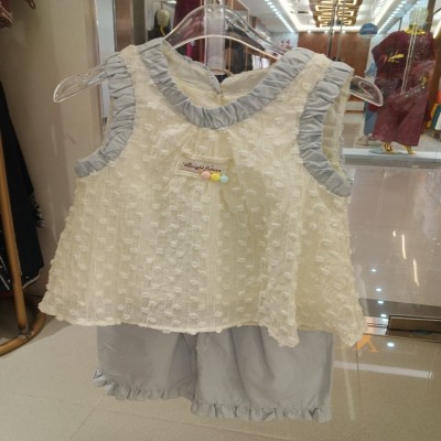 Textured Swiss Dot Sleeveless Top and Light Blue Shorts